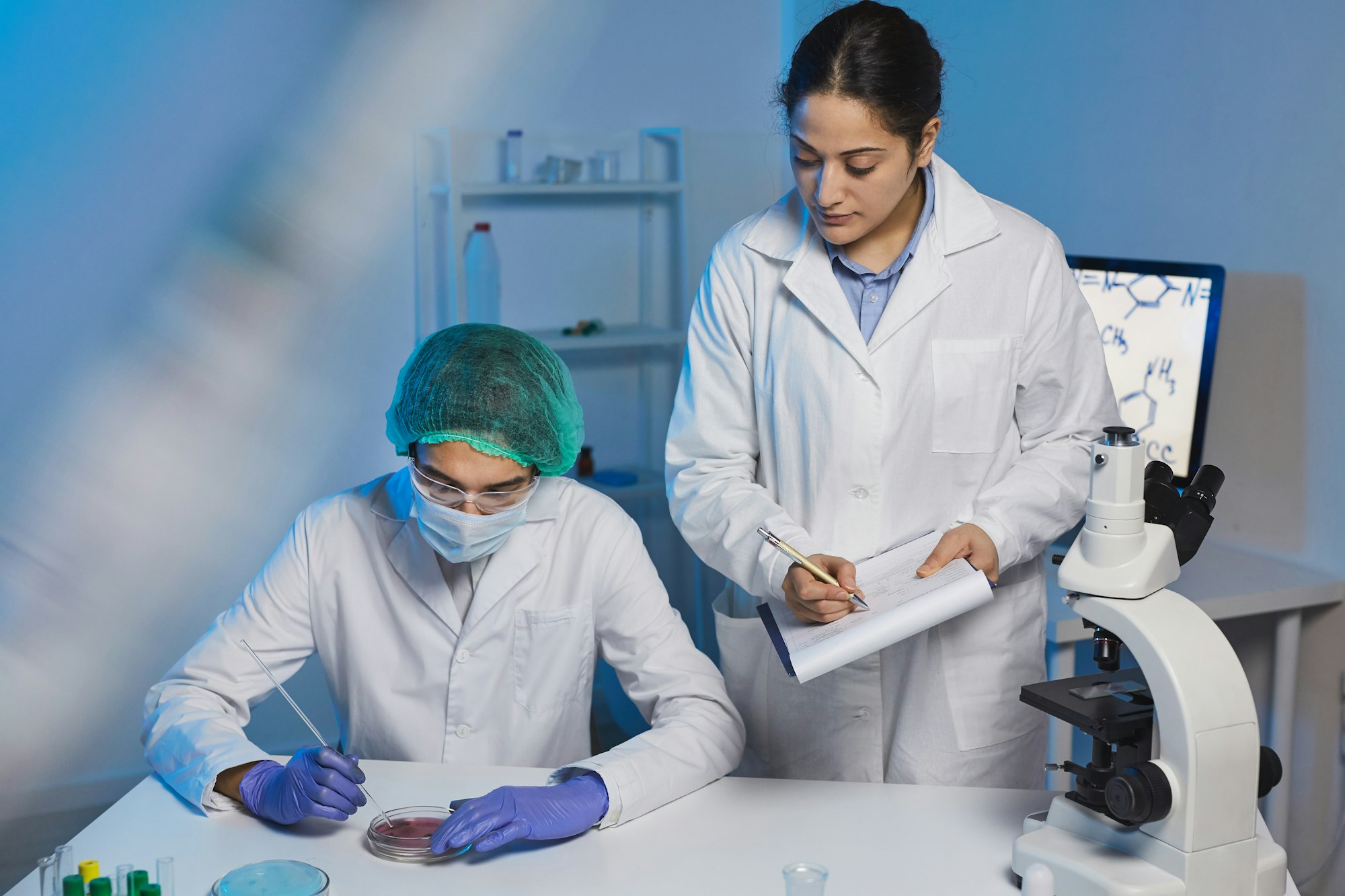 Clinical researchers working in laboratory